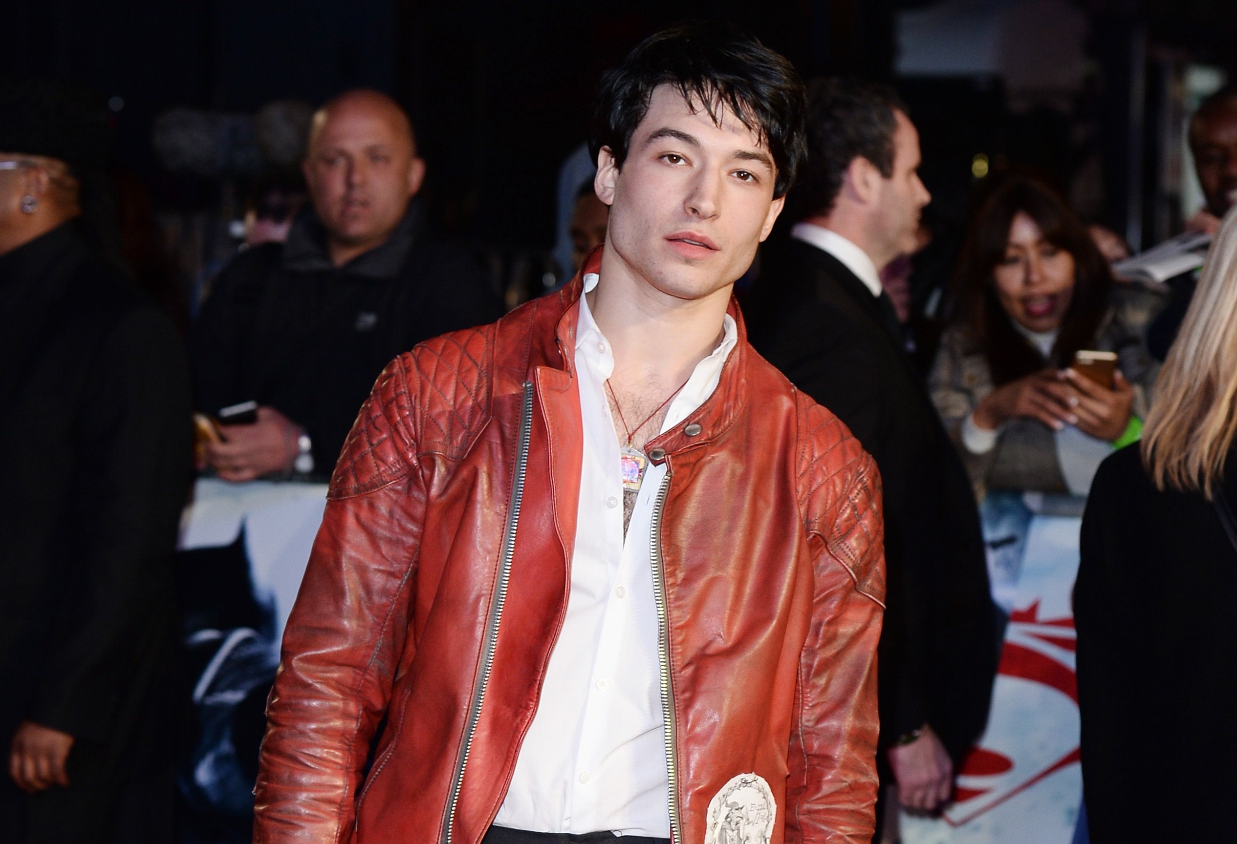 Ezra Miller poses for cameras at the Batman v. Superman: Dawn of Justice premiere