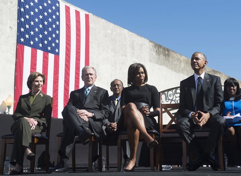 US President Barack Obama, First Lady Michelle Obama, former US President George W. Bush, and Laura Bush -- a real life red vs blue state, Democrats vs Republicans divide