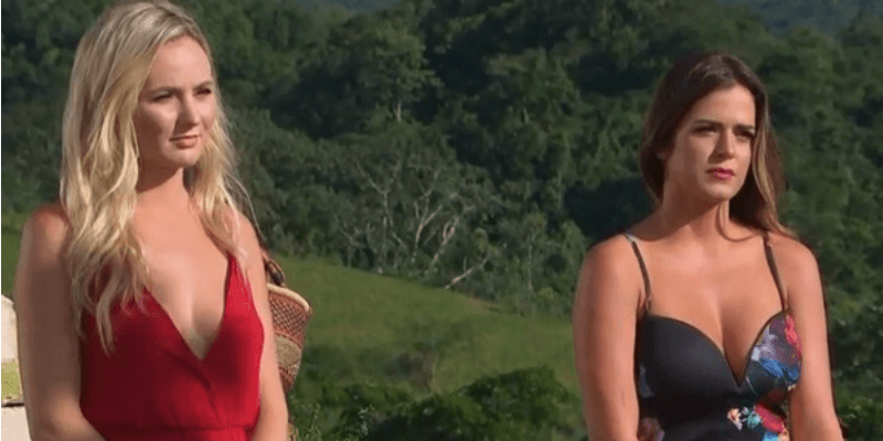 Jojo and Lauren are standing next to each other in a field on The Bachelor.