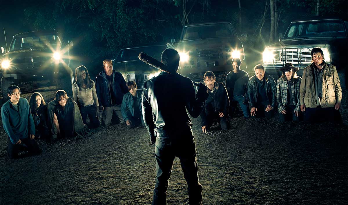 Negan stands in front of his potential victims in a scene from Season 7 of AMC's 'The Walking Dead'