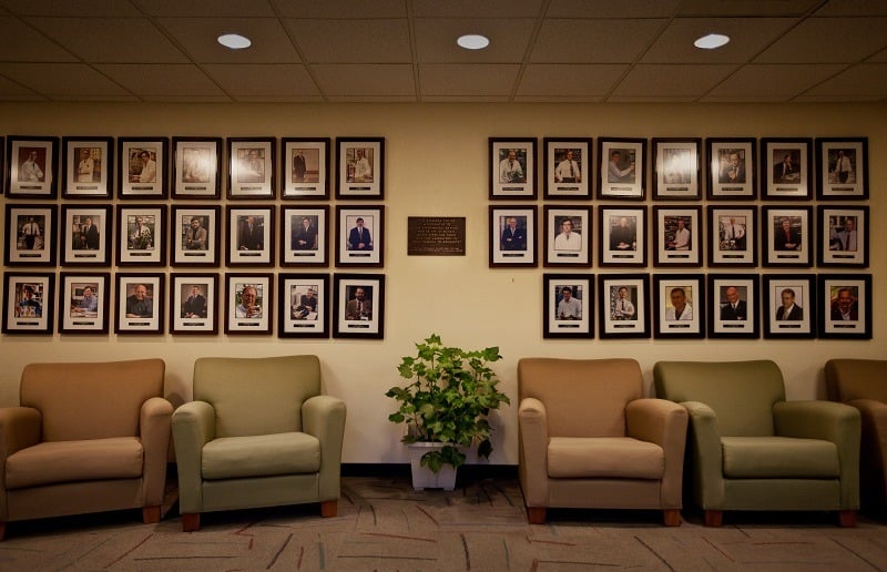 Images on the wall of fame inside Monsanto agribusiness headquarters in St Louis