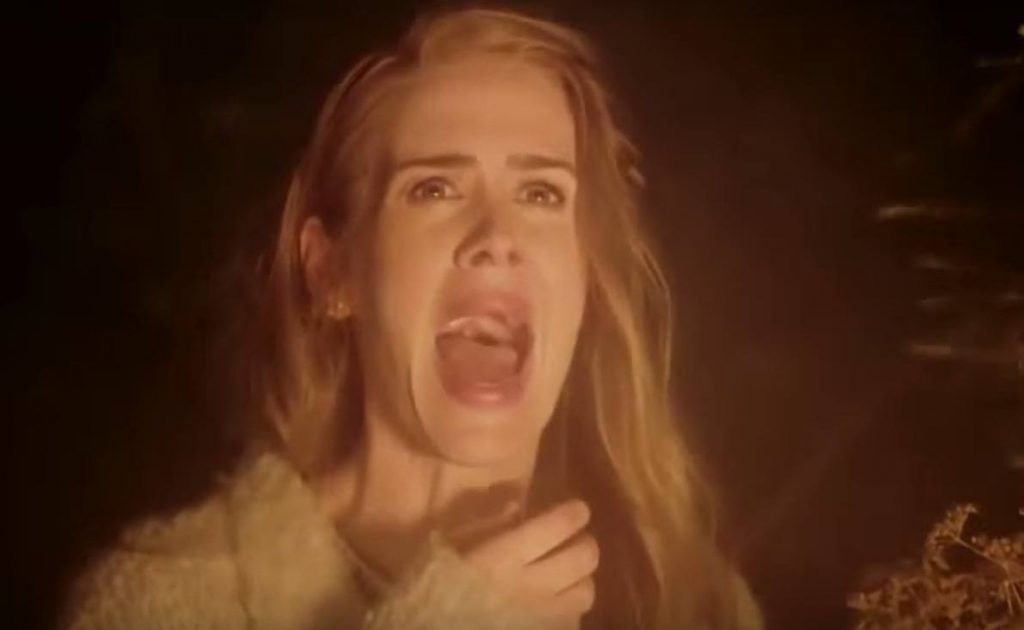 Sarah Paulson screams and holds a hand to her throat in Season 6 of FX's American Horror Story