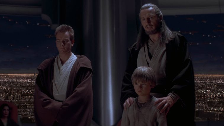 Qui-Gon Jinn, Anakin Skywalker, and Obi-Wan Kenobi stand together