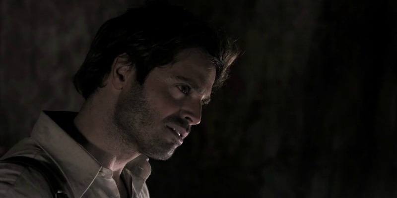 David Charvet stares to the side in Prisoners of the Sun