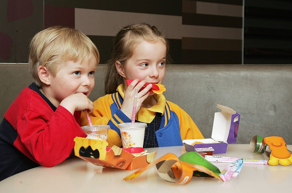 young children eating at McDonald's
