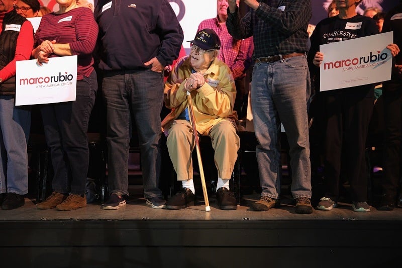 A senior citizens listen to Republican Sen. Marco Rubio at a rally