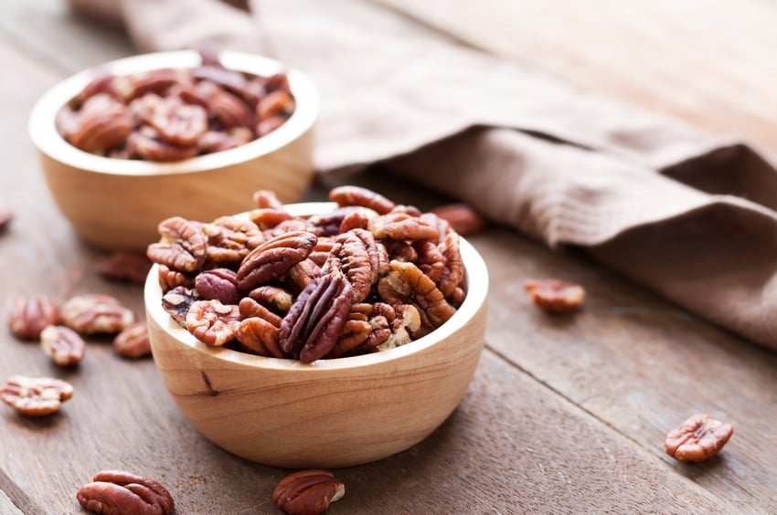 Pecan nuts in wooden bowel