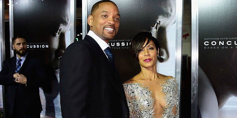Will and Jada Pinkett-Smith pose on the red carpet together.