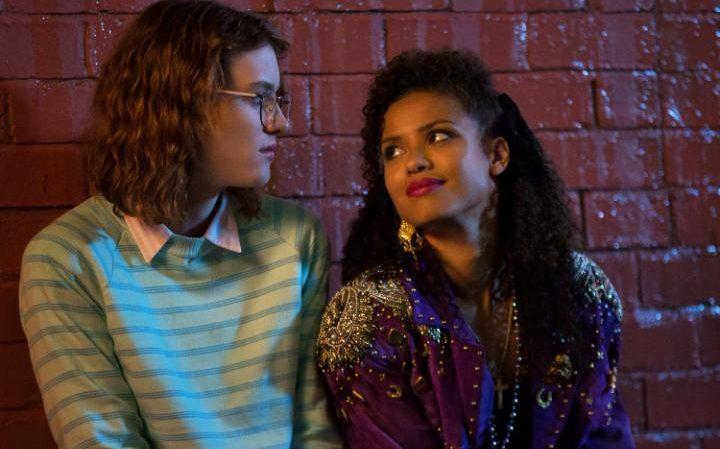 Yorkie (Mackenzie Davis) and Kelly (Gugu Mbatha-Raw) share a moment in a scene from the 'Black Mirror' episode "San Junipero"