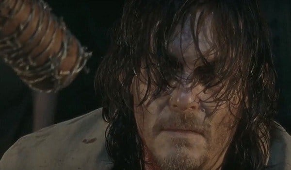 Daryl (Norman Reedus) stares at Negan's baseball bat in a scene from 'The Walking Dead'