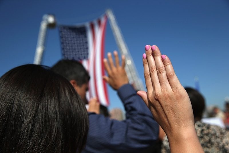 Immigrants become American citizens during a naturalization ceremony at Liberty State Park