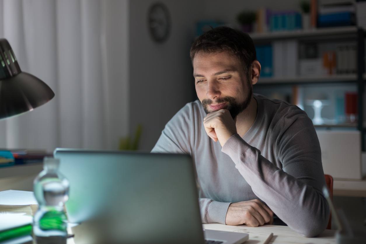 man on computer