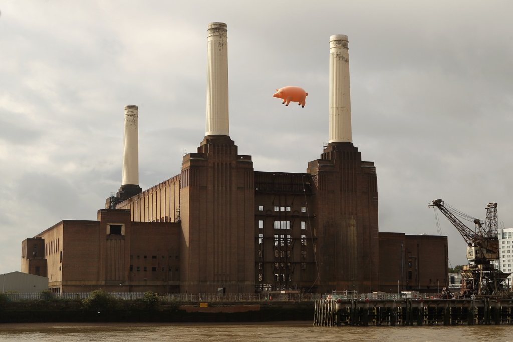 An inflatable pig flies above Battersea Power Station in a recreation of Pink Floyd's 'Animals' album cover on September 26, 2011 in London, England. The classic Pink Floyd album artwork was recreated to mark the release of several digitally remastered versions of their albums.