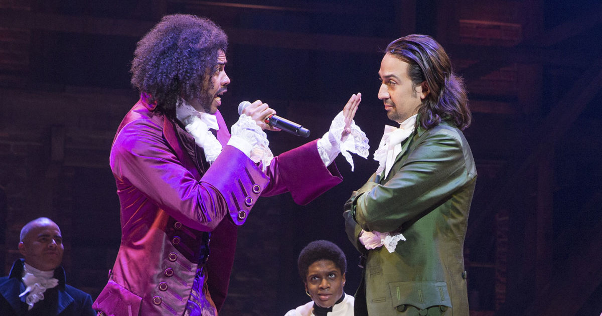 Jefferson (Daveed Diggs) and Hamilton (Lin-Manuel Miranda) engage in a rap battle in a scene from 'Hamilton'