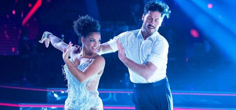Laurie Hernadez and Maksim Chmerkovskiy dancing together on Dancing With the Stars