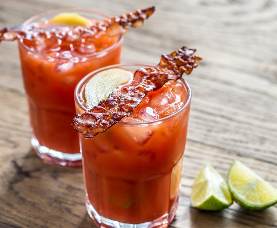Two glasses of Bloody Mary with bacon