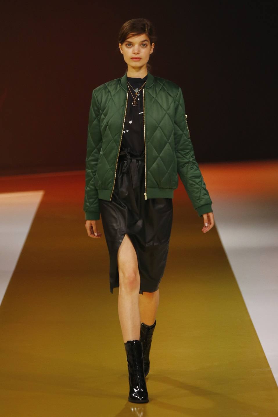 A model walks the runway at the Zalando fashion show
