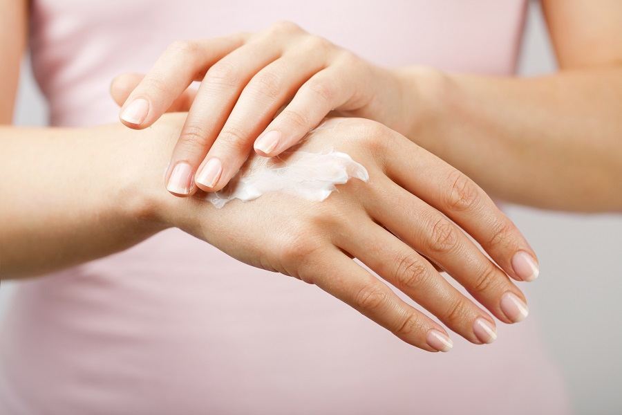woman hands with cream