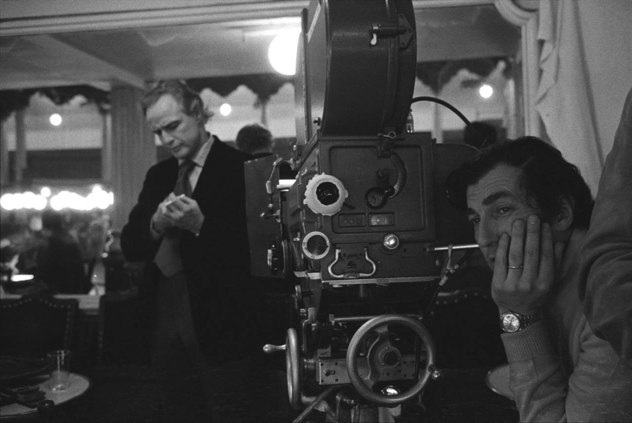 Marlon Brando and Bertolucci in between shots during the filming of 'Last Tango in Paris'
