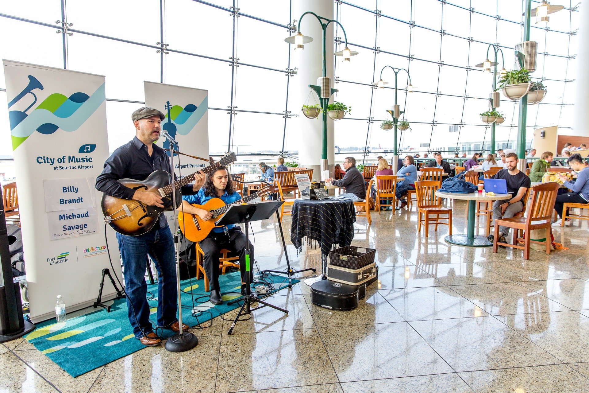 musicians perform at seatac airport