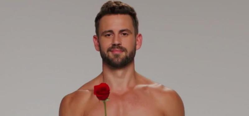 Nick Viall with a rose