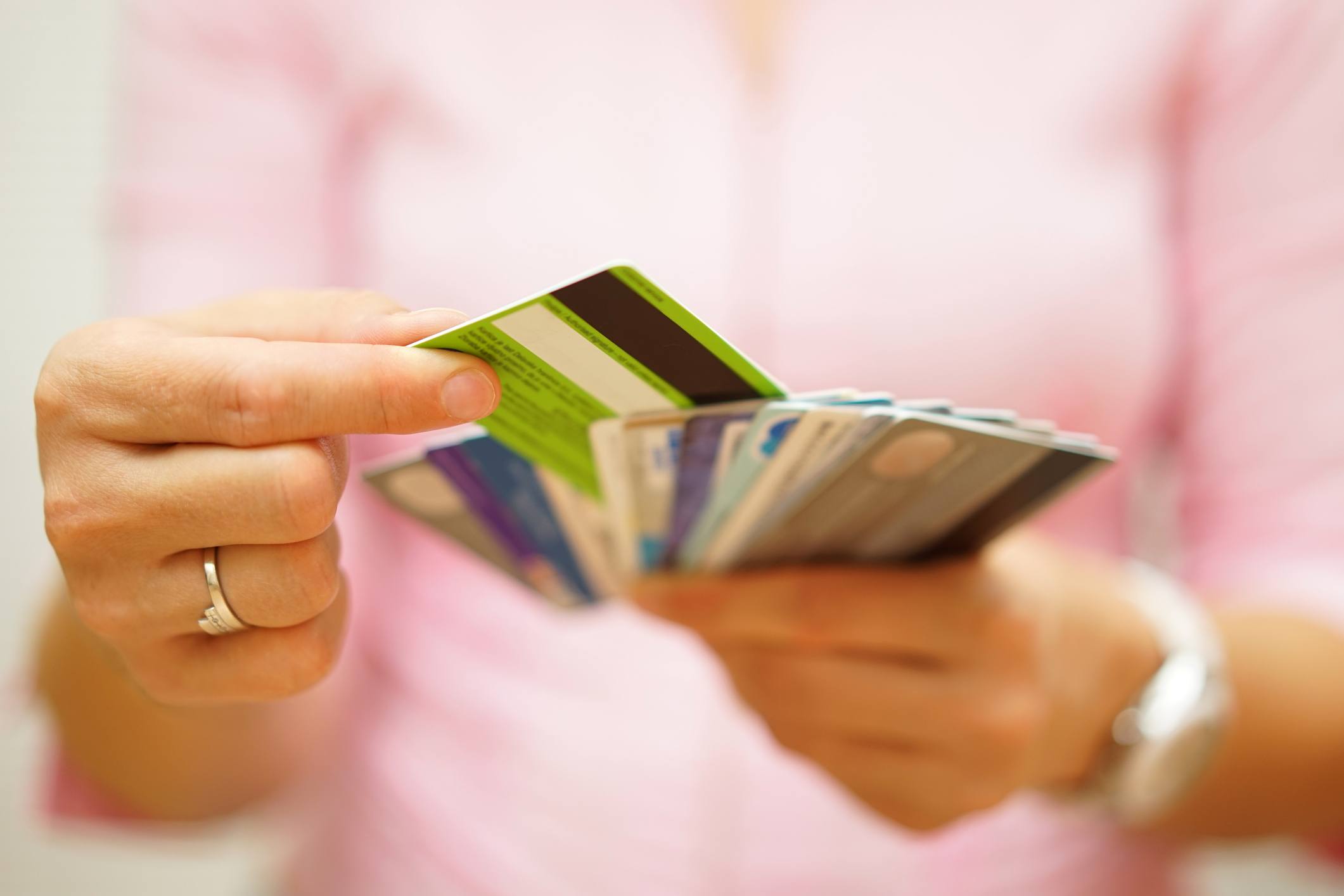 woman holding gift cards