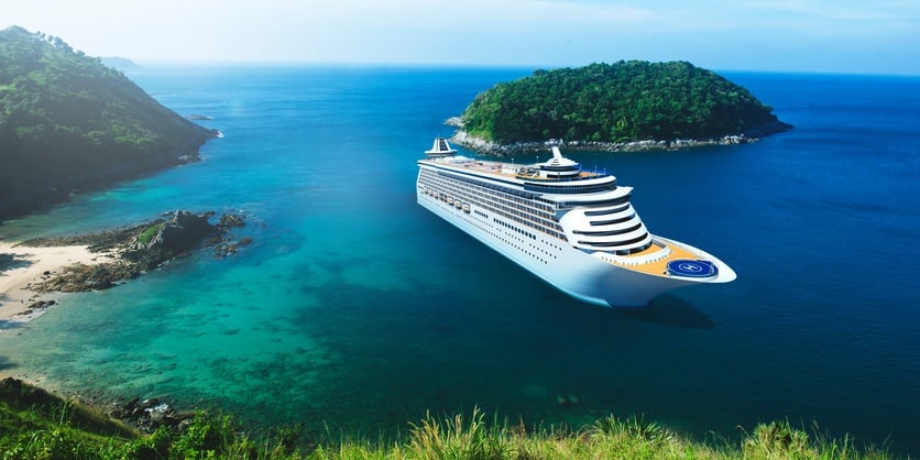cruise ship in ocean near islands