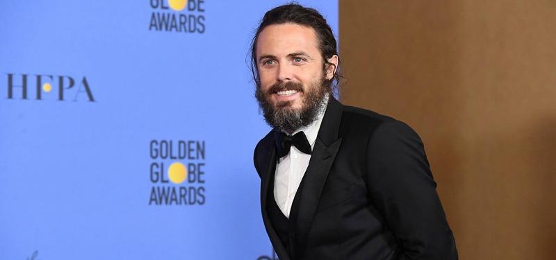 Casey Affleck poses in the press room during the 74th Annual Golden Globe Awards