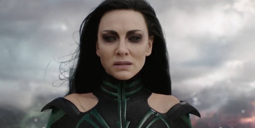 Cate Blanchett as Hela in Thor: Ragnarok looking disgusted with black hair and a dark suit