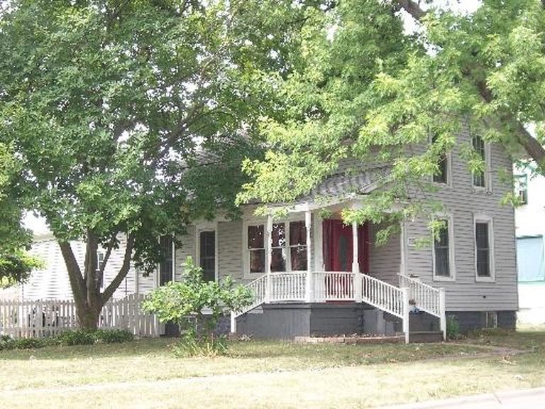 home shaded by trees