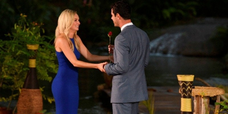 Ben Higgins is giving Lauren Bushnell a rose on The Bachelor.