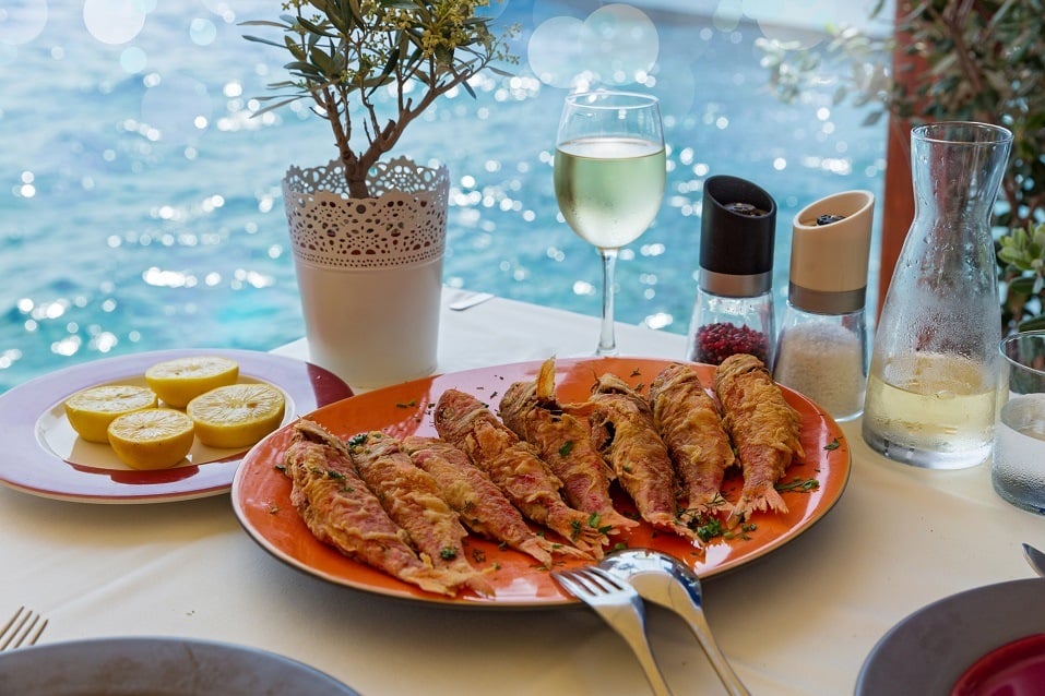 Fried red mullet fish on the plate