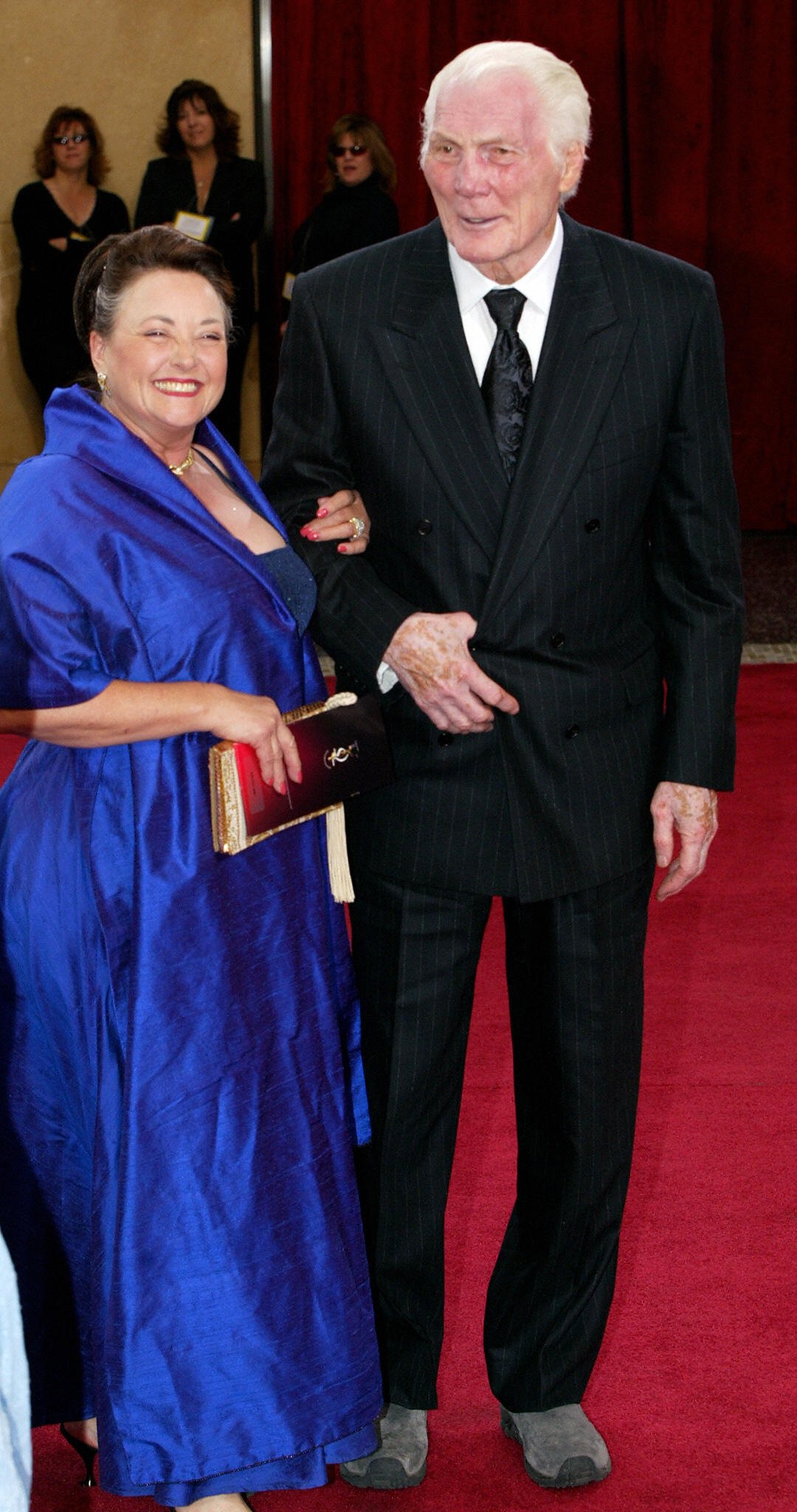Jack Palance arrives with his wife Elaine