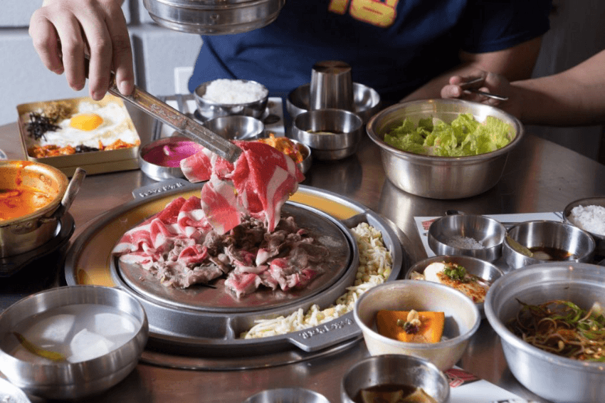 dishes on a table at Kang Ho Dong Baekjong