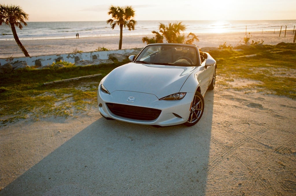 2017 Mazda Miata GT parked on a beach