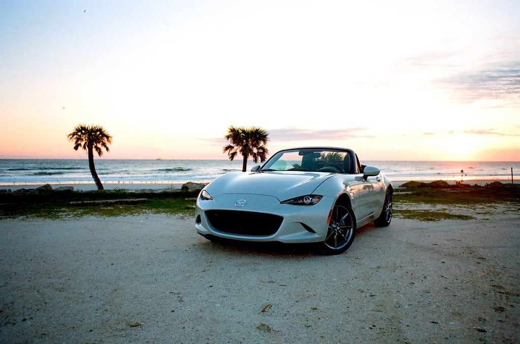2017 Mazda Miata GT parked on a beach