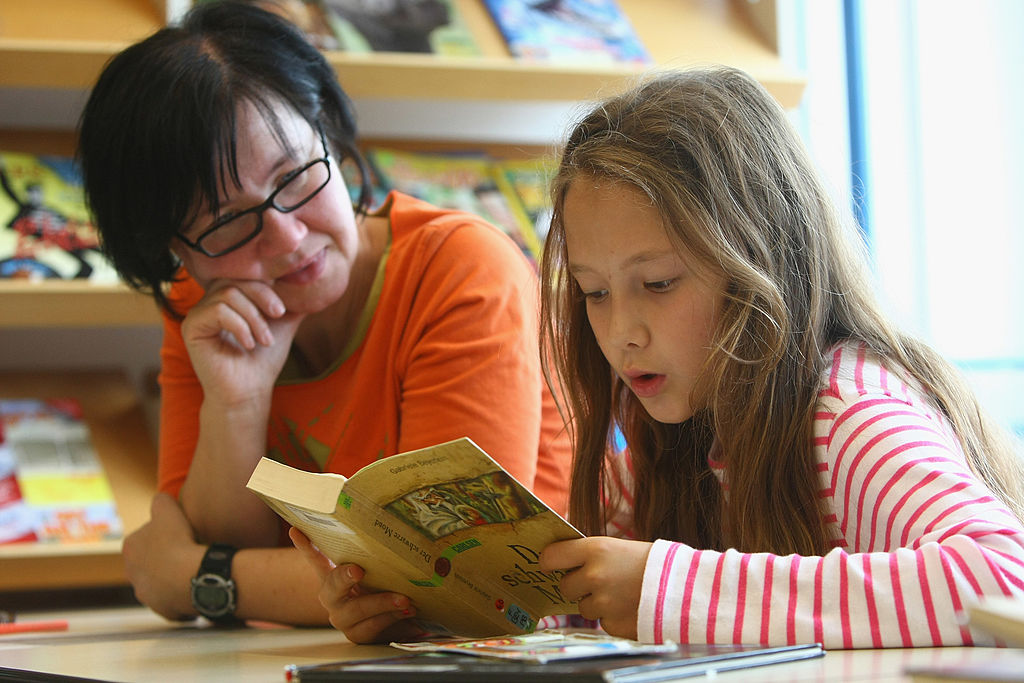 A student reads a book