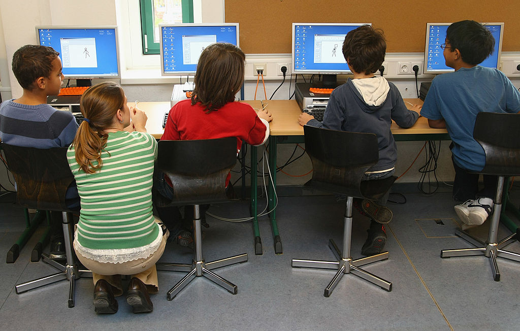 students at work on their computers
