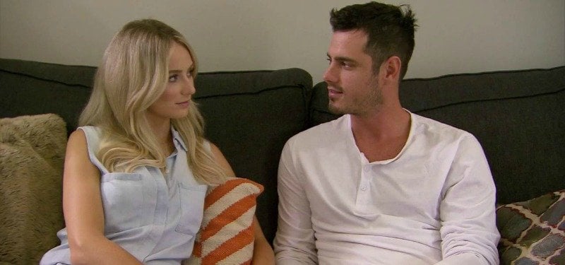 Ben and Lauren are sitting on a couch looking at each other on Ben & Lauren Happily Ever After?