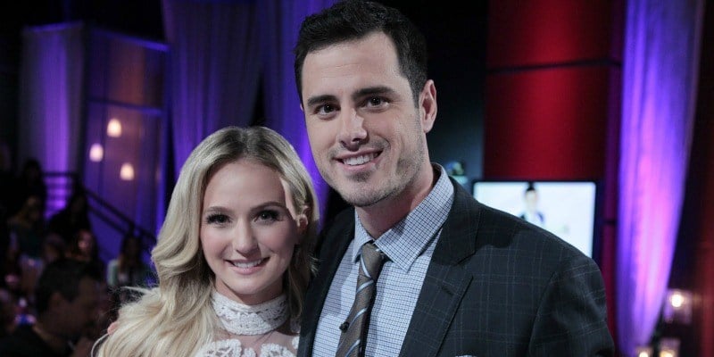 Ben Higgins and Lauren Bushnell are smiling next to each other.
