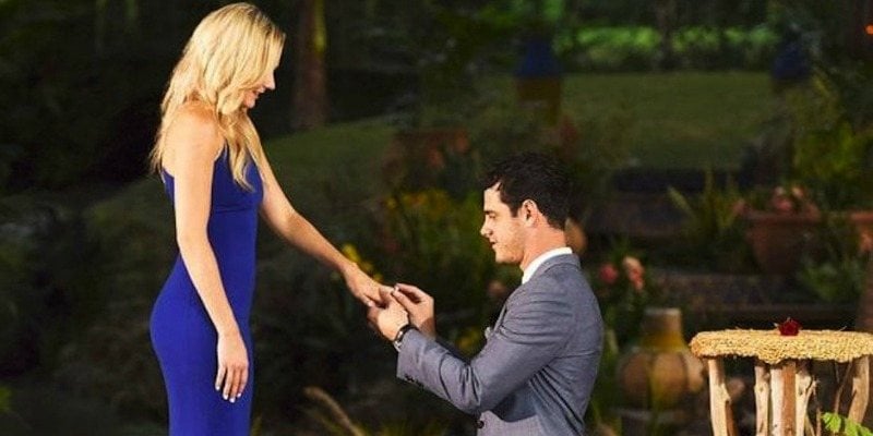 Ben is on one knee and is proposing to Lauren on The Bachelor.