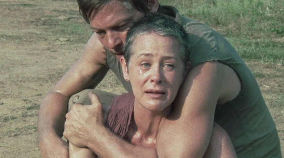 Daryl embraces Carol as she cries at the sight of Sophia as a zombie in 'The Walking Dead' episode 'Pretty Much Dead Already'