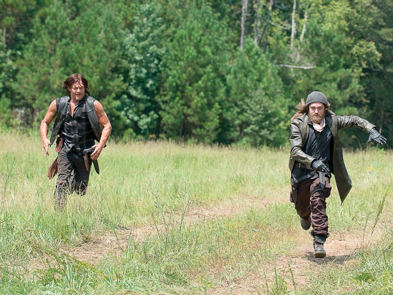 Daryl chases Jesus through a field in 'The Walking Dead' episode 'The Next World'