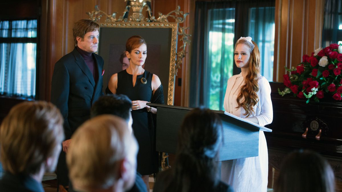 The Blossom family stands in front of a Jason Blossom's casket in The CW's Riverdale