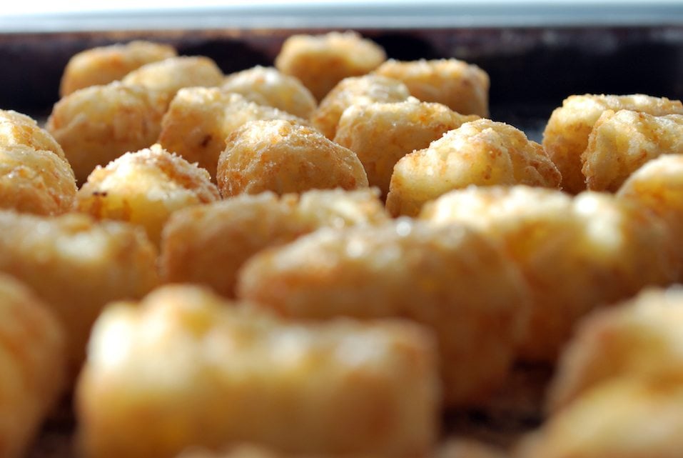 A close up of cooked tater tots