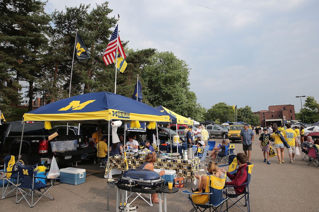 Michigan Wolverines fans at a tailgate