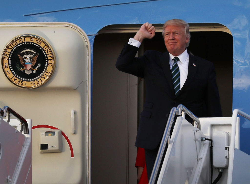 President Donald Trump arrives on Air Force One at the Palm Beach International Airport.