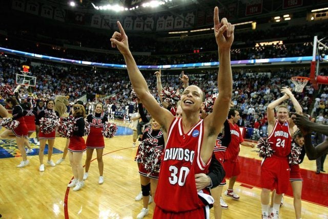 Stephen Curry of the Davidson Wildcats celebrates a major upset during March Madness.