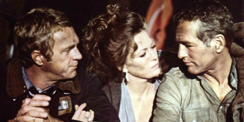 Steve McQueen, Faye Dunaway and Paul Newman sitting down together in The Towering Inferno.