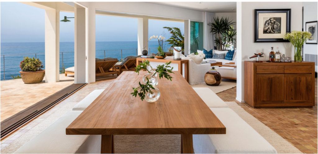 An interior view of Cindy Crawford's malibu home features a wraparound porch and ocean views.